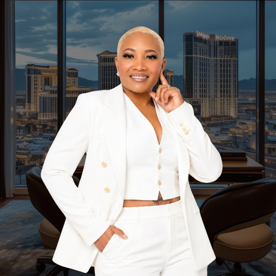 Erica Nelson, founder of Millionaire Mindset Academy, in a white suit before a city skyline